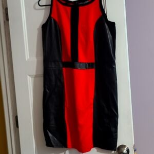 Red and black dress with vegan leather look side panels.